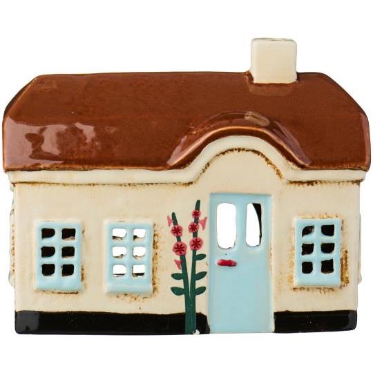 Ib Laursen Lichthaus Ebeltoft mit Stockrosen und hellblauer Tür